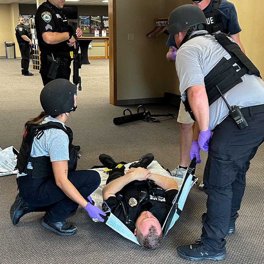 Photo of EMS helping someone injured (JPG) 